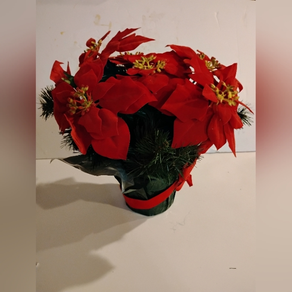 Red Poinsettia Artificial Arrangement In A Pot For The Holiday Season